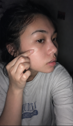 Applying pimple patch at night
